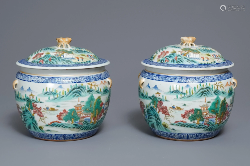 A pair of Chinese famille rose bowls and covers with