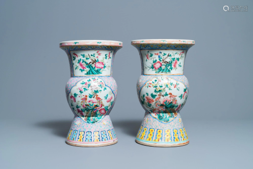 A pair of Chinese famille rose spittoons for the