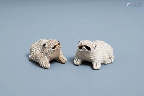 A pair of Chinese biscuit models of frogs or toads,