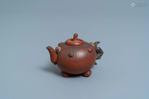 A Chinese Yixing stoneware teapot and cover with