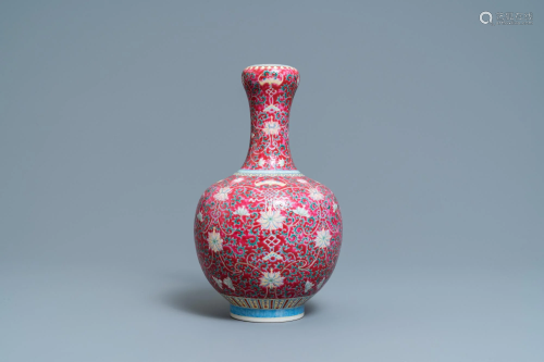 A Chinese famille rose ruby-ground bottle vase,
