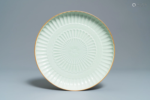 A Chinese celadon-glazed 'chrysanthemum' charger,