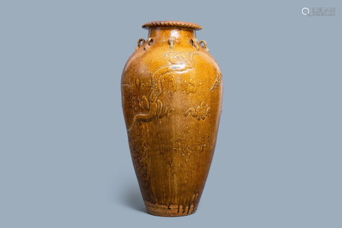 A large Chinese brown-glazed relief-molded martaban jar