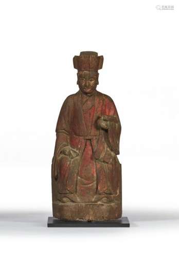 CHINE - Vers 1900 Dignitaire en bois polychrome, assis sur u...