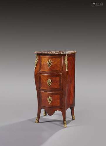 Petite commode en bois de rose et amarante de forme mouvemen...