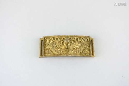 CHINE - XIXe siècle Boucle de ceinture en bronze doré à déco...