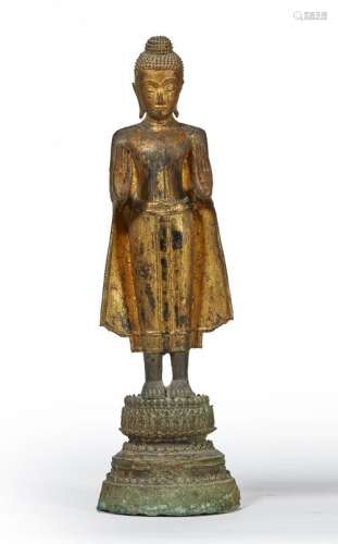 THAILANDE - Vers 1900 Bouddha en bronze laqué doré, debout s...