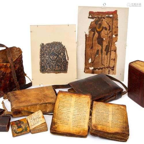 Three antique Ethiopian Coptic bibles and textile fragments