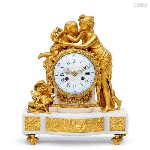 A Louis XVI ormolu and white marble mantle clock