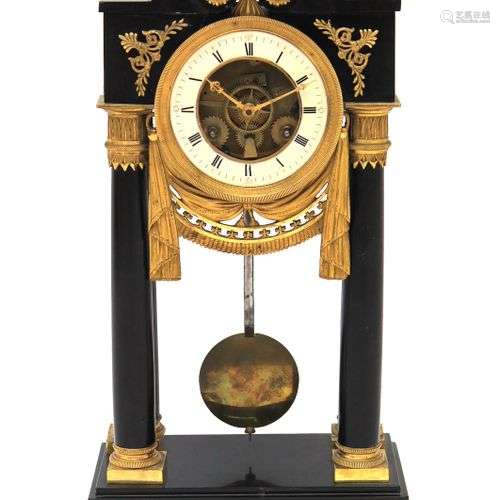 A French ormolu-mounted black marble portico clock