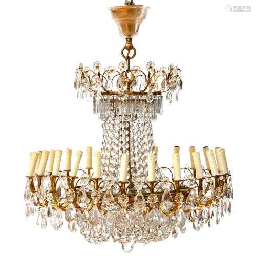 An Italian gilt-metal and cut-glass twenty-eight light chand...