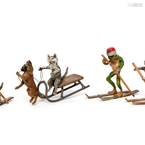 Four Viena bronze miniature, cats on skis