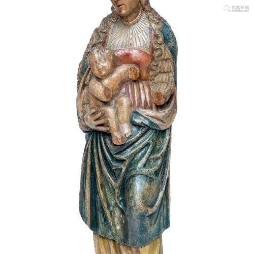 A carved and polychrome painted wooden figure of the Virgin ...