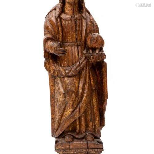 A large carved and parcel-gilt walnut figure of St. Agnes of...