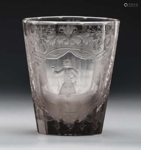 A German engraved and faceted beaker glass dated 1709