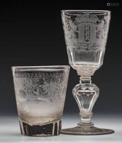 An engraved Amsterdam armorial goblet and a small beaker vas...