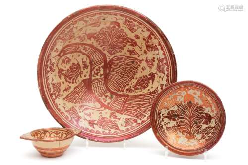 A Hispano Moresque charger and two smaller bowls