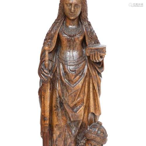 A Southern-Netherlands carved oak figure of St. Catherine of...