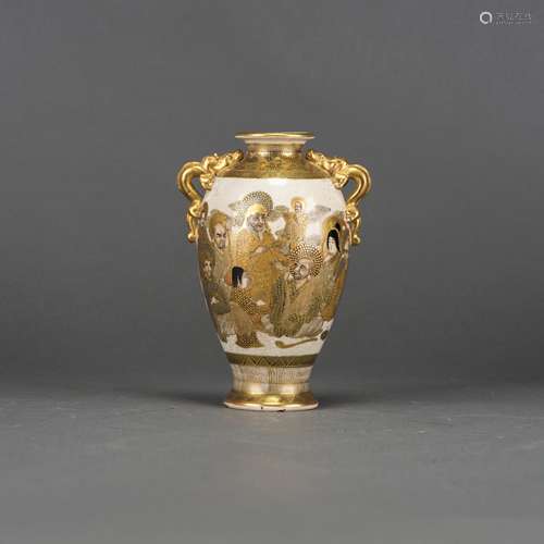 A GILT DECORATED 'FIGURAL' VASE