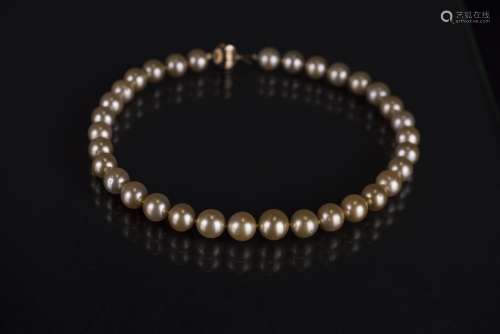A 14KT GOLDEN SOUTH SEA PEARL NECKLACE, WITH AIGL CERTIFIED
