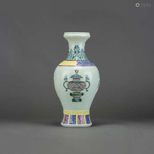 A CHINESE SANCAI CARVED VASE