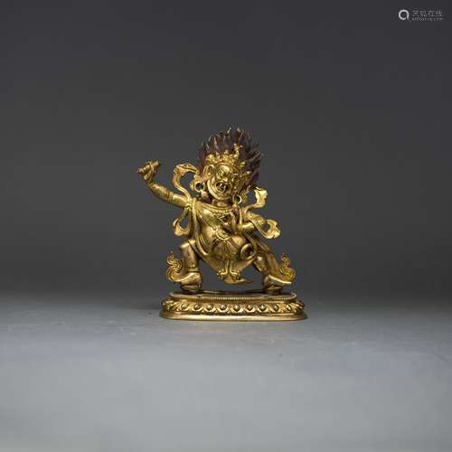 A GILT-BRONZE FIGURE OF BUDDHA