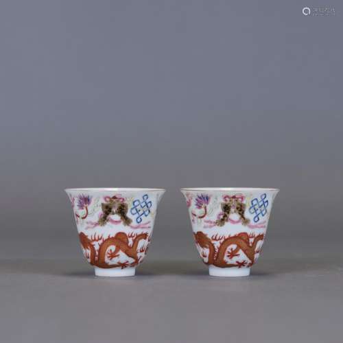 A PAIR OF FAMILLE ROSE AND IRON RED DECORATED 'DRAGON' CUPS