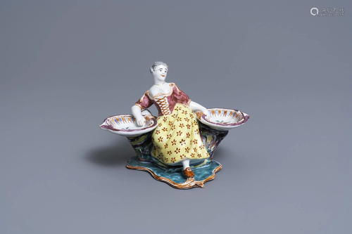 A Dutch Delft polychrome petit feu figural salt cellar,