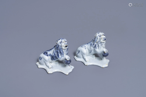 A pair of Dutch Delft blue and white models of lions,