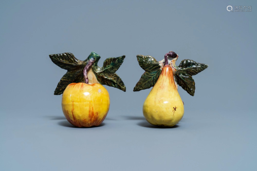 A polychrome Dutch Delft model of an apple and one of a