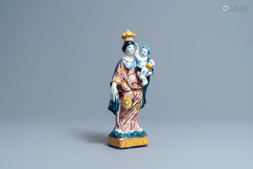 A polychrome Dutch Delft figure of the Madonna with