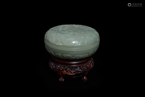 A Chinese pale celadon jade 'phoenix and peony'
