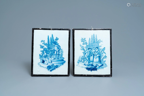 A pair of Dutch Delft blue and white plaques with black