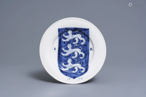 A Dutch Delft blue and white dish with the arms of