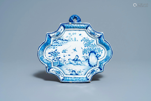 A Dutch Delft blue and white chinoiserie plaque, 18th
