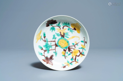 A Chinese sancai-glazed plate with carved floral