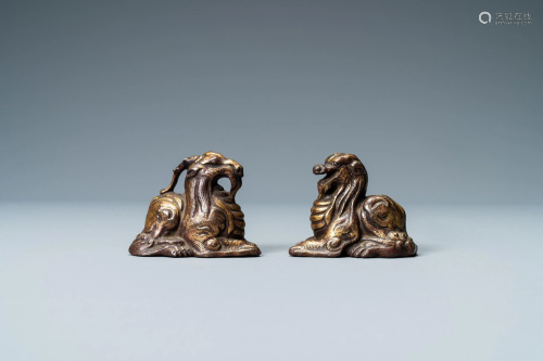 Two Chinese gilt and lacquered bronze 'mythical beast'