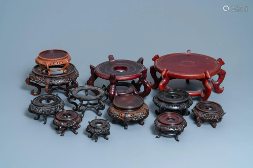 Twelve large round Chinese carved wooden stands,