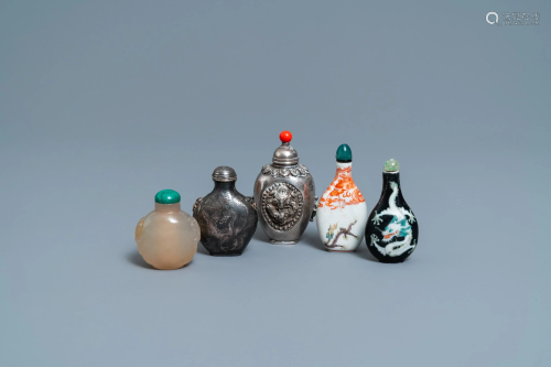 Five Chinese agate, porcelain and silver snuff bottles,