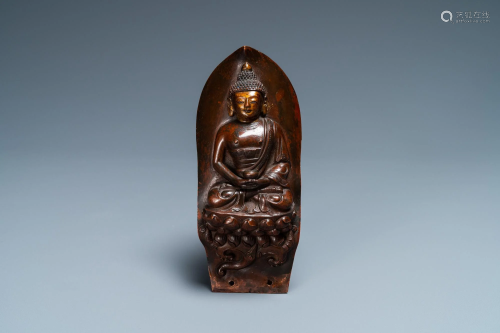 A gilt-lacquered hammered copper 'Buddha' plaque,