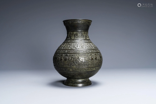 A Chinese archaic bronze inscribed 'hu' vase, 17/18th