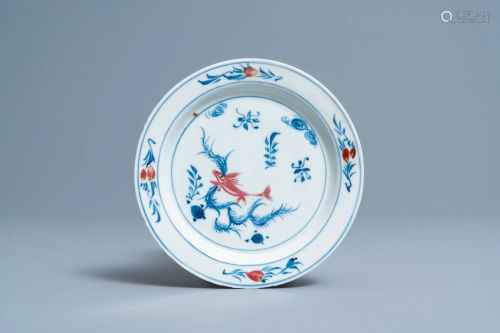A Chinese blue, white and copper-red 'fish' plate,