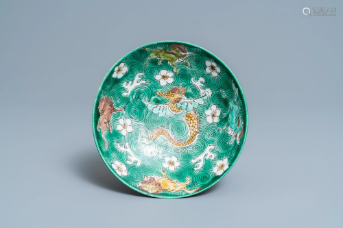 A shallow Chinese verte biscuit 'mythical beast' bowl,