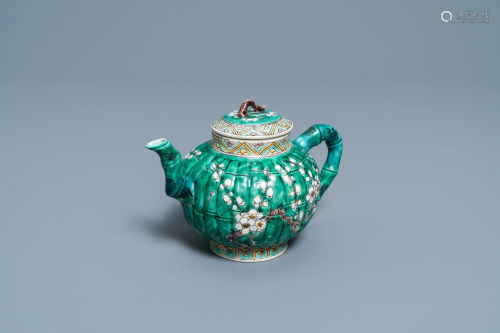 A Chinese verte biscuit teapot and cover, Kangxi