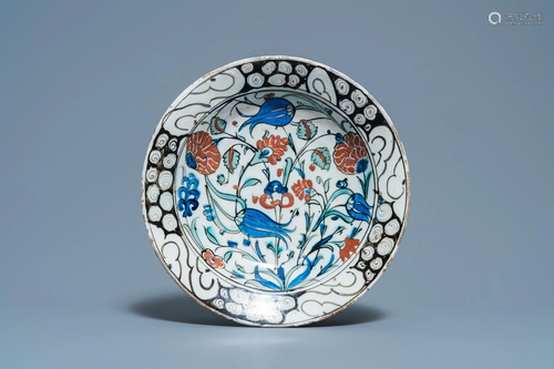 An Iznik dish with tulips and carnations, Turkey, ca.