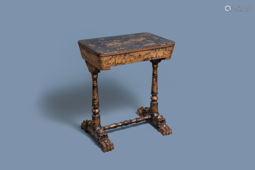 A Chinese parcel-gilt black lacquer sewing table with