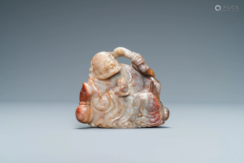 A Chinese carved 'Shoushan' soapstone figure of an