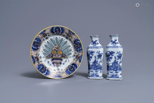 A pair of Dutch Delft blue and white vases and a