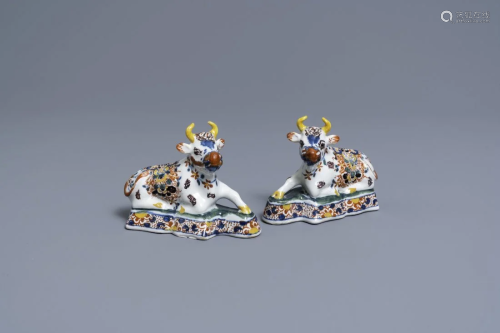 A pair of polychrome Dutch Delft models of cows, 18th