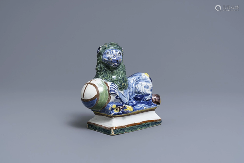 A polychrome Dutch Delft model of a lion, 18th C.